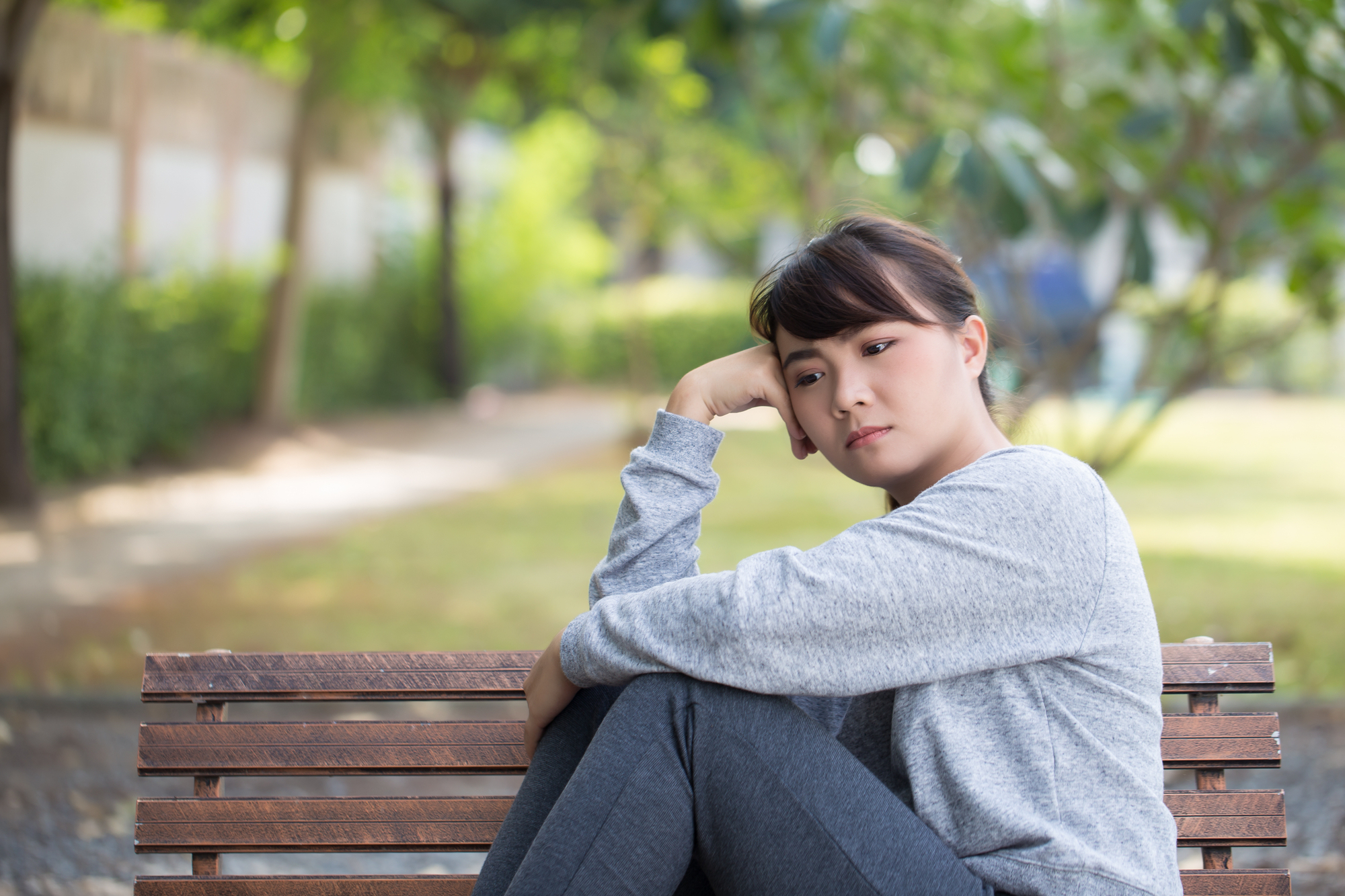 Lonely woman at park