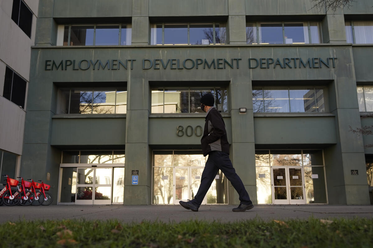 A person passes the office of the California Employment Development Department in Sacramento, Calif. The EDD reported a drop in unemployment in May 2024 across the North Bay and California. (AP Photo/Rich Pedroncelli, File — Dec. 18, 2020)